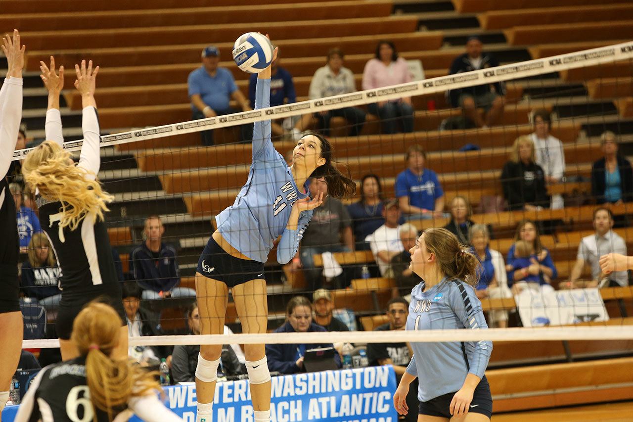 Western Washington’s Kayleigh Harper, an Oak Harbor alum, leaps in the air to spike a ball during a match against Rockhurst in the NCAA Division II Volleyball Championships on Dec. 10, 2015, in Tampa Bay, Fla. (Western Washington University photo)