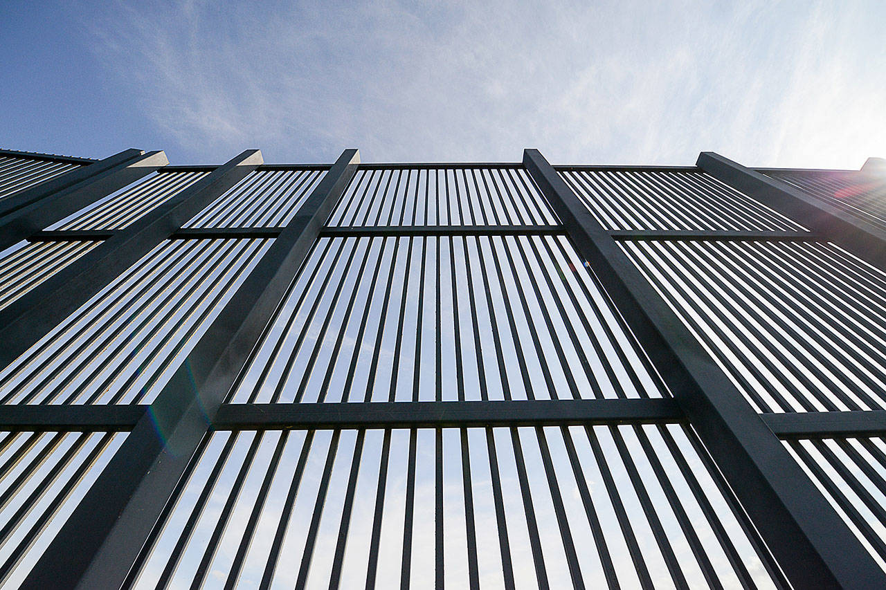 A section of the border fence along the U.S.-Mexico border in Brownsville, Texas. As a billionaire business tycoon, Donald Trump forged deals to acquire or develop casinos, luxury condo towers and lush golf courses. Now, as president, Trump aims to build perhaps his most ambitious and certainly his most contentious structure yet: A wall along the nearly 2,000-mile border between the United States and Mexico. (Jason Hoekema/The Brownsville Herald)