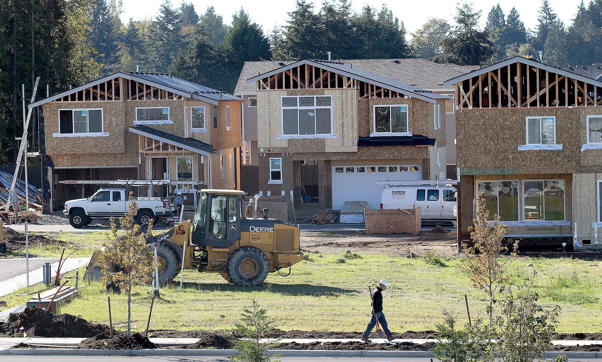 New houses go up across the street from the new North Creek High School in Bothell on Oct. 11, 2016.. The Snohomish County Council is considering extending a cap on school-impact fees to $7,000. (Andy Bronson / The Herald)