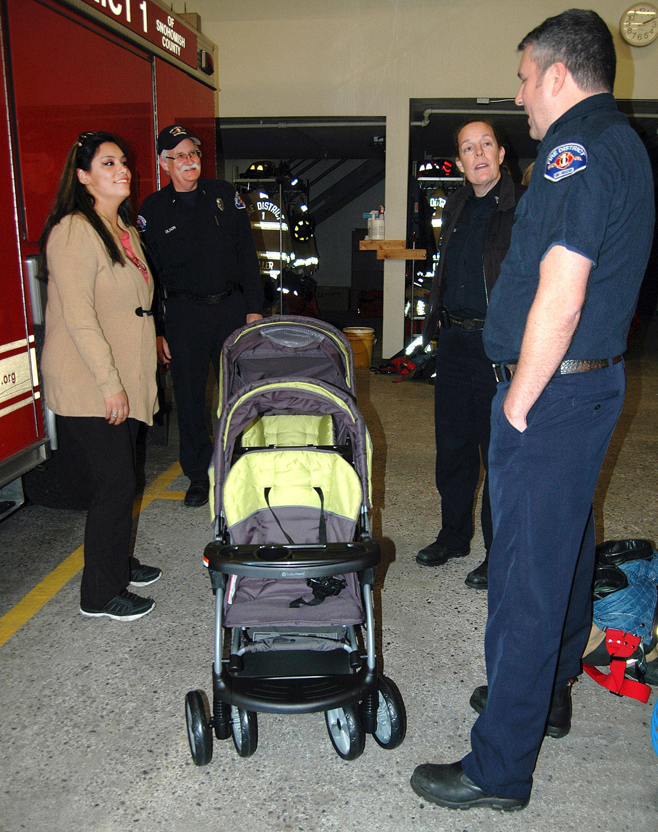 Firefighters come to the rescue and give mom new stroller | HeraldNet.com