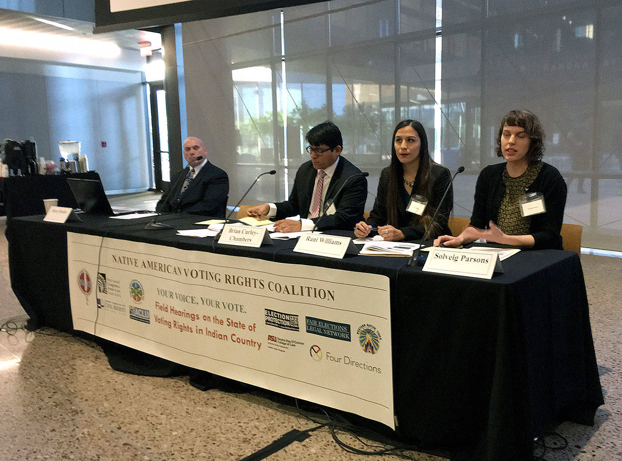 Sandra Day O’Connor College of Law at Arizona State University students with the Indian Legal Clinic offer their recommendations to improve the voting access and participation of Indians across the state Thursday in Phoenix. (AP Photo/Anita Snow)