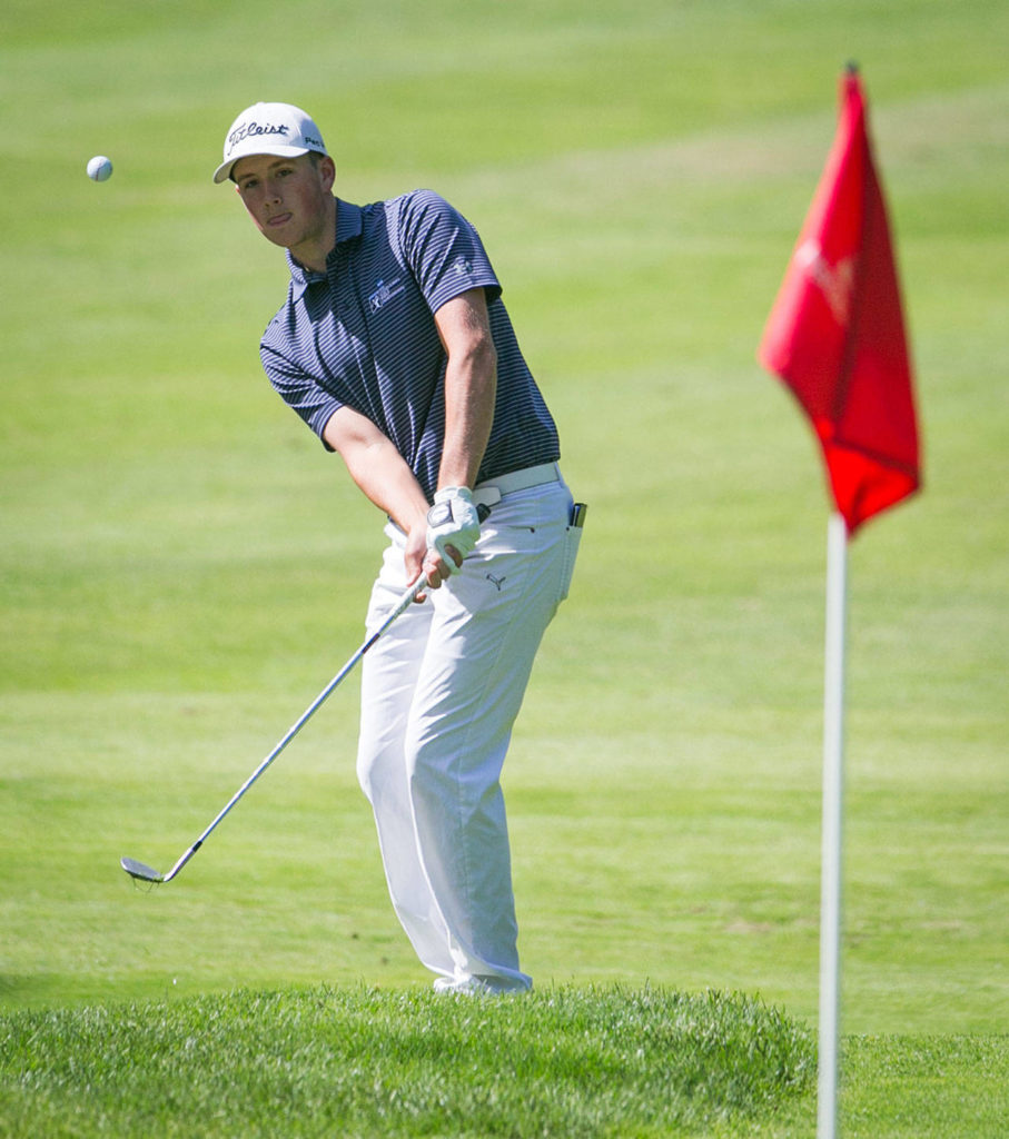 Jordan Brajcich hits out of the rough on the second day of the 2018 Snohomish County Amateur golf tournament on May 27, 2018, at Harbour Pointe Golf Course in Mukilteo. (Kevin Clark / The Herald)
