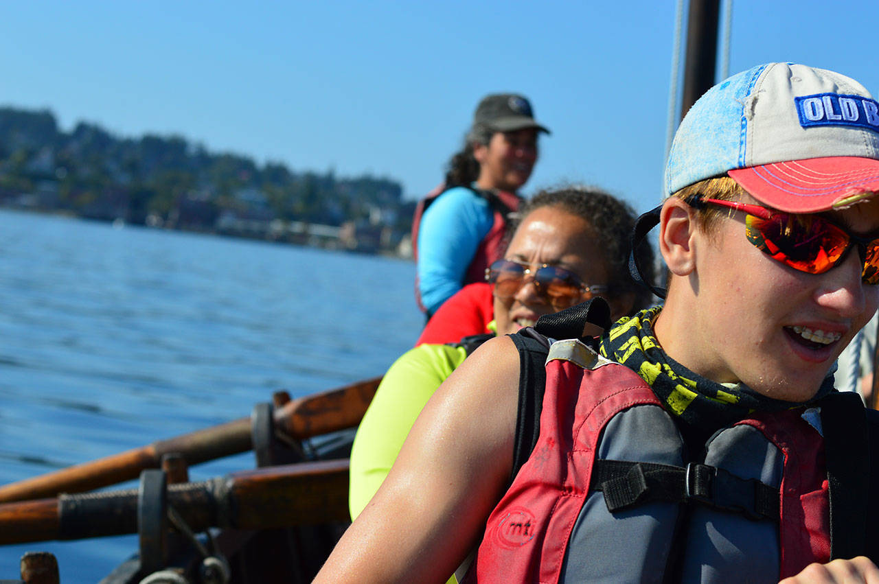 Jeremy Miller, 16, of Cockeysville, Maryland, and Gabe Santiago, of Sequim, row into Port Townsend Bay on Friday. (Diane Urbani de la Paz/for Peninsula Daily News)