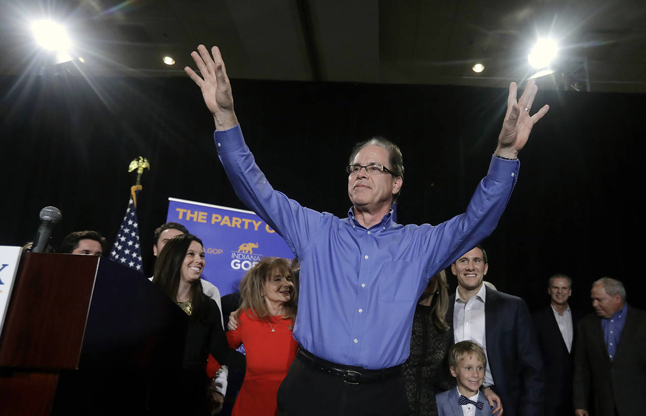 Republican Mike Braun reacts celebrates during an election night party, Tuesday in Indianapolis, after defeating Sen. Joe Donnelly, D-Ind. (AP Photo/Darron Cummings)