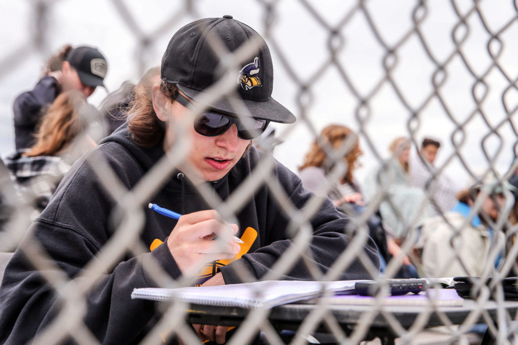 Patchett was a constant presence at Lake Stevens baseball games over the past eight seasons, keeping score and recording play-by-play audio for nearly 200 contests. (Kevin Clark / The Herald)
