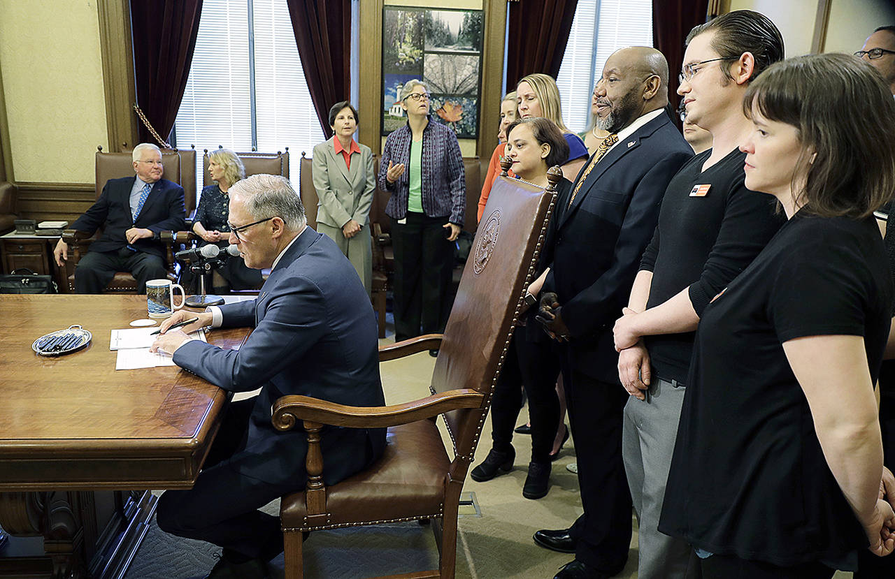 Inslee Signs Bills Tightening Gun Rules | HeraldNet.com