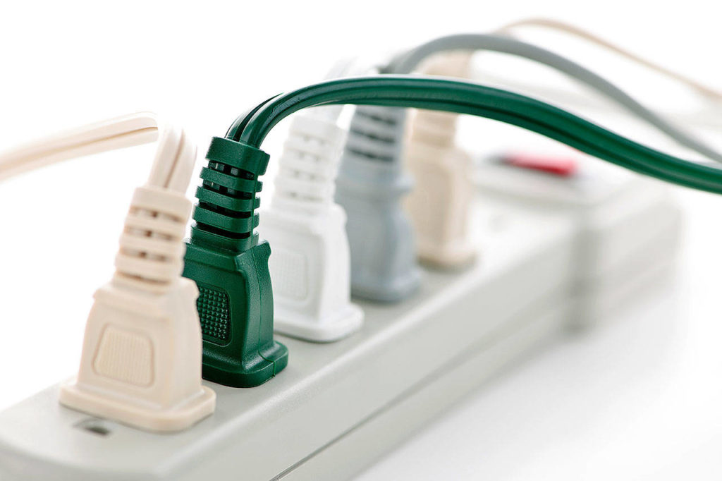 Electronic devices switched off but still plugged in are consuming energy. So group your TV, gaming consoles, DVR and other entertainment electronics together on one power strip. Switch off the power strip when you’re done to save energy. (Getty Images)
