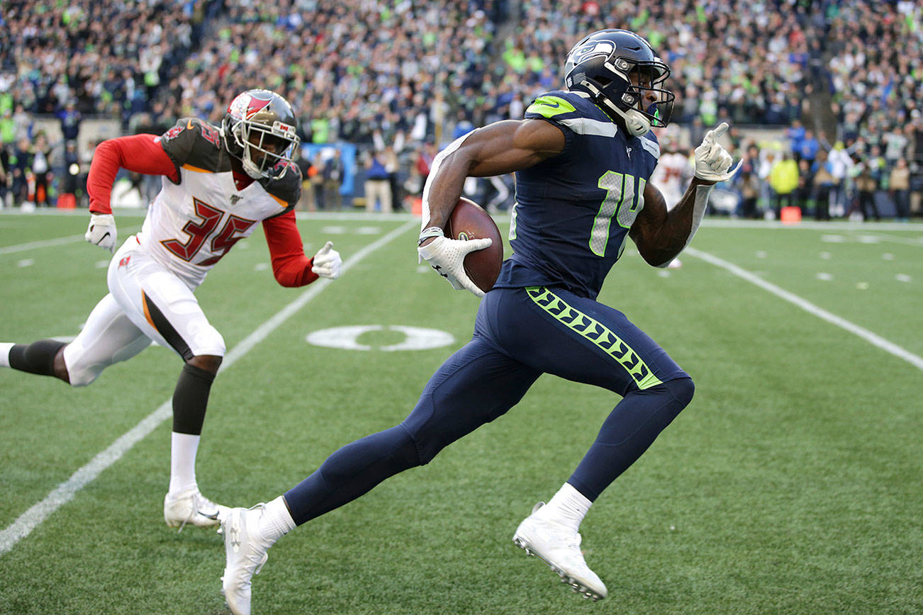 Metcalf back with Seahawks after testing 100-meter dash - The San