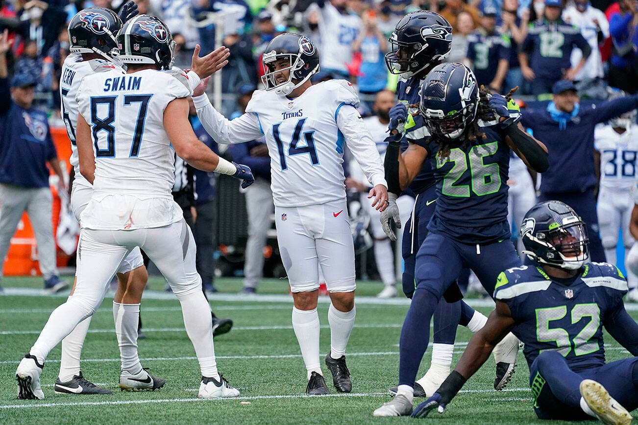 October 16, 2022: Seattle Seahawks safety Ryan Neal (26) reacts to a  defensive stop during a