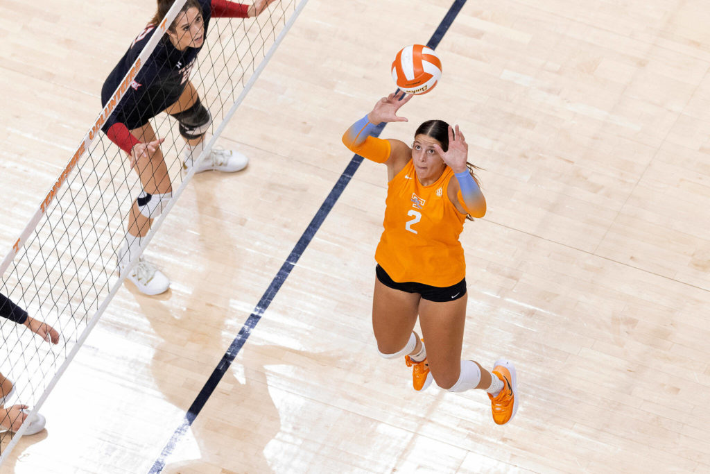 Tennessee’s Natalie Hayward, an Archbishop Murphy graduate, sets the ball during a game against Texas Tech on Aug. 27 in Knoxville, Tennessee. (University of Tennessee athletics)
