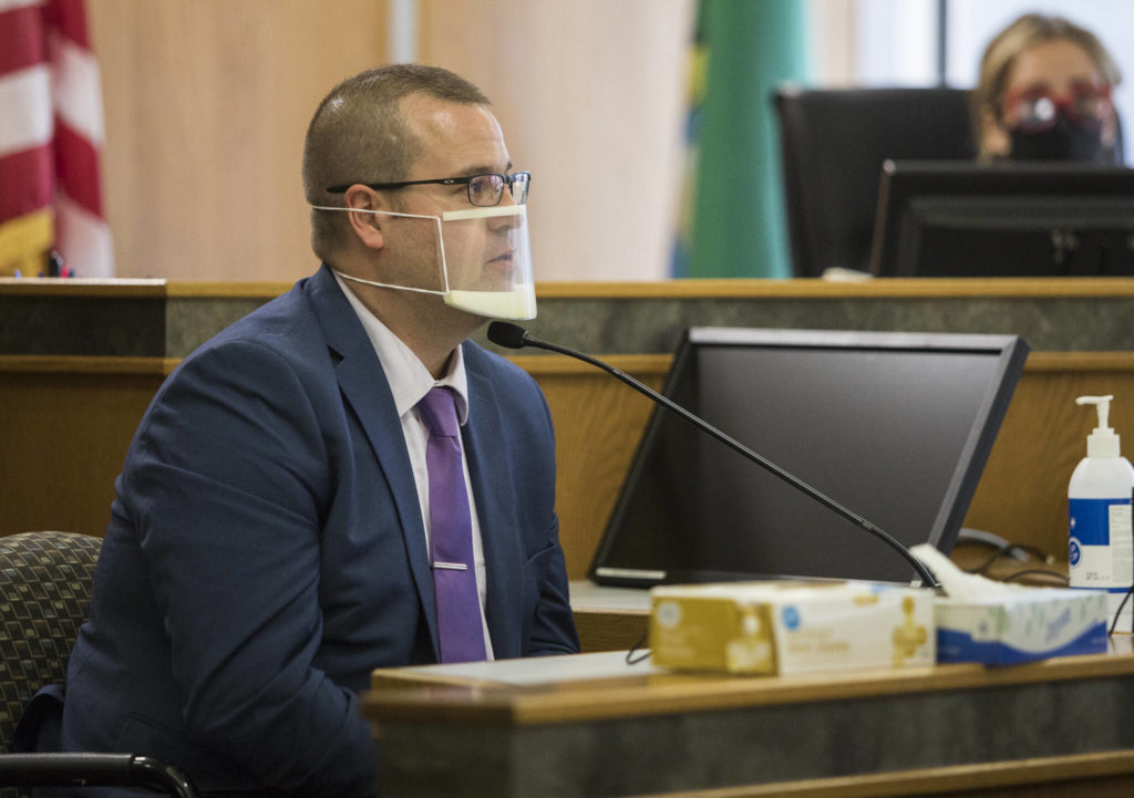 Everett police detective Alexander Helphrey testifies during the trial of Frank Walton on Thursday in Everett. (Olivia Vanni / The Herald)
