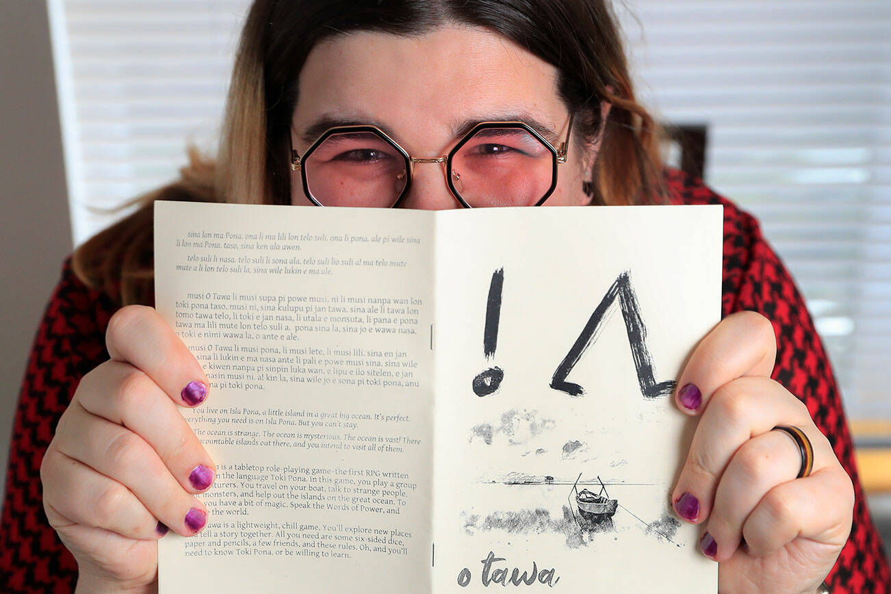 Lara Turner is an indie game designer who writes tabletop role-playing games and explores gender and trans identity. Photographed at her home in Everett, Washington on February 7, 2022.  (Kevin Clark / The Herald)