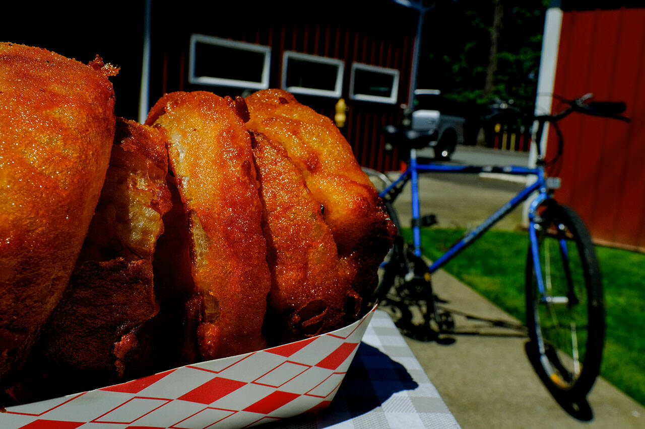 Stop by Nutty’s Junkyard, located right off the Centennial Trail in Arlington, for juicy burgers and the crispiest onion rings that food reporter Taylor Goebel has ever tried. (Taylor Goebel / The Herald).