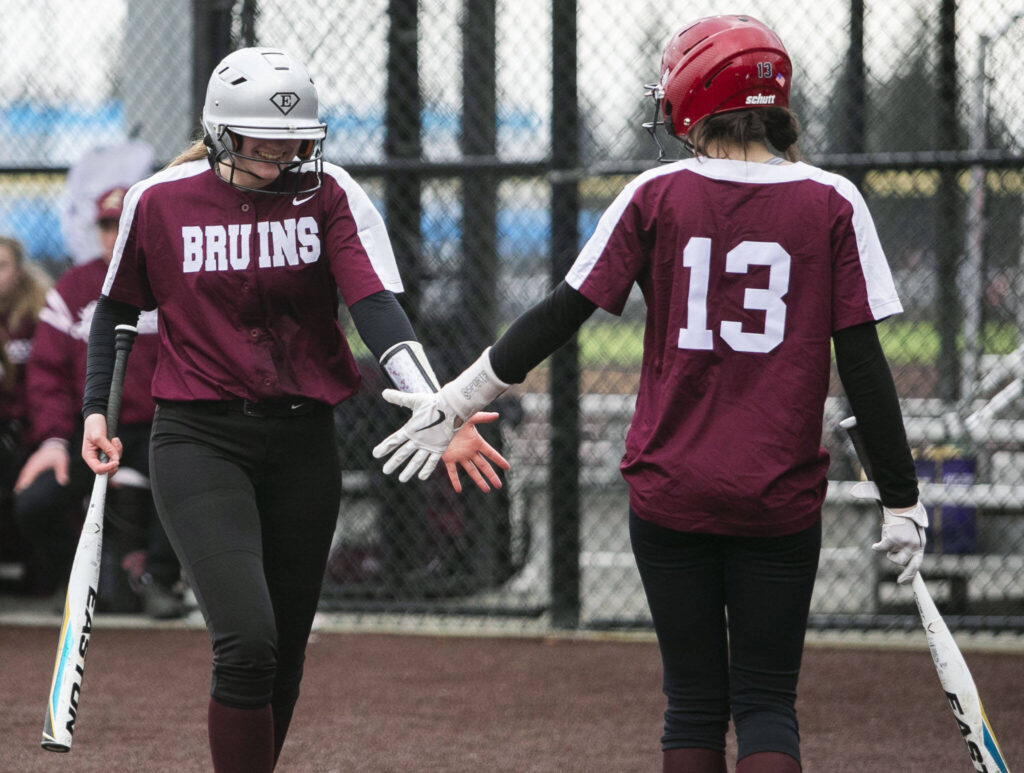 Cascade’s Sophia Tripp high-fives a teammate during the game against Lakewood on Monday, March 13, 2023 in Everett, Washington. (Olivia Vanni / The Herald)
