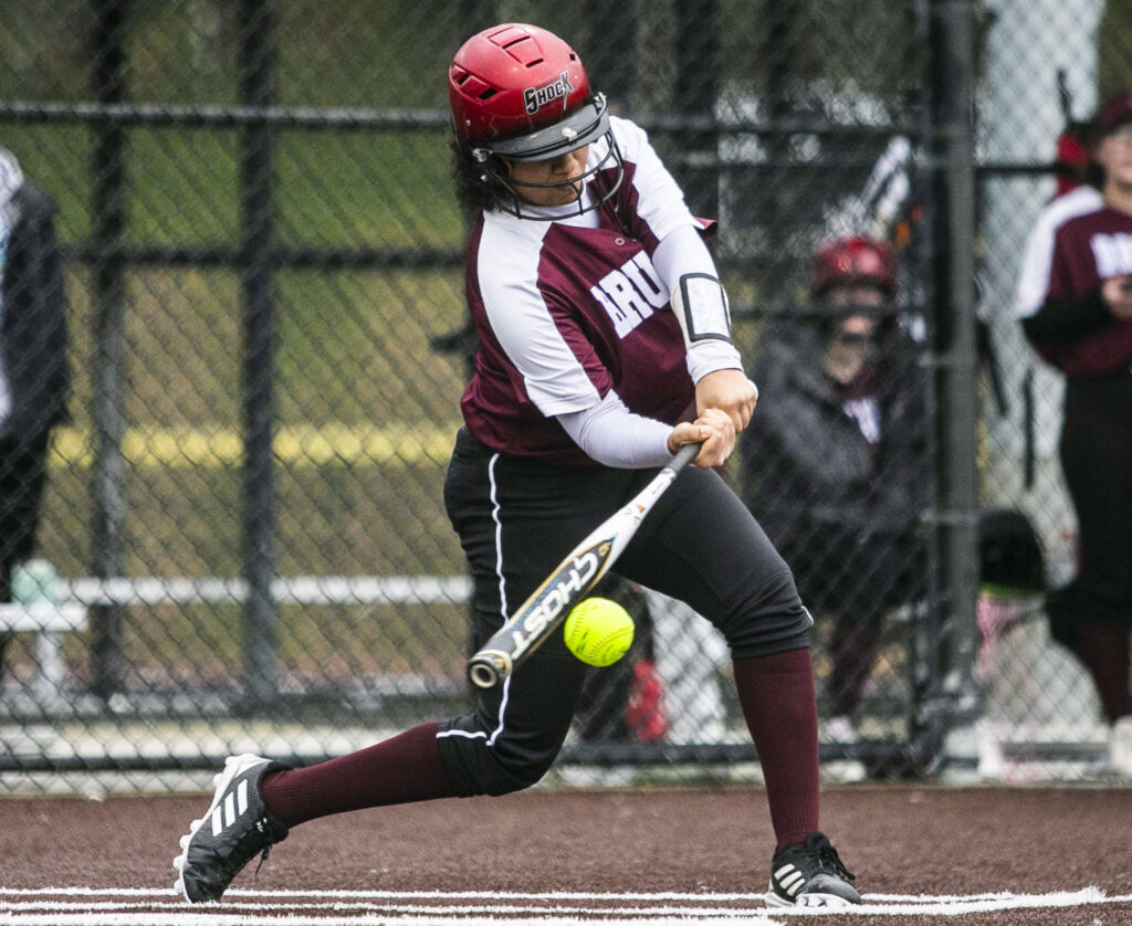 Cascade’s Jaidyn Wilson gets a hit during the game against Lakewood on Monday, March 13, 2023 in Everett, Washington. (Olivia Vanni / The Herald)
