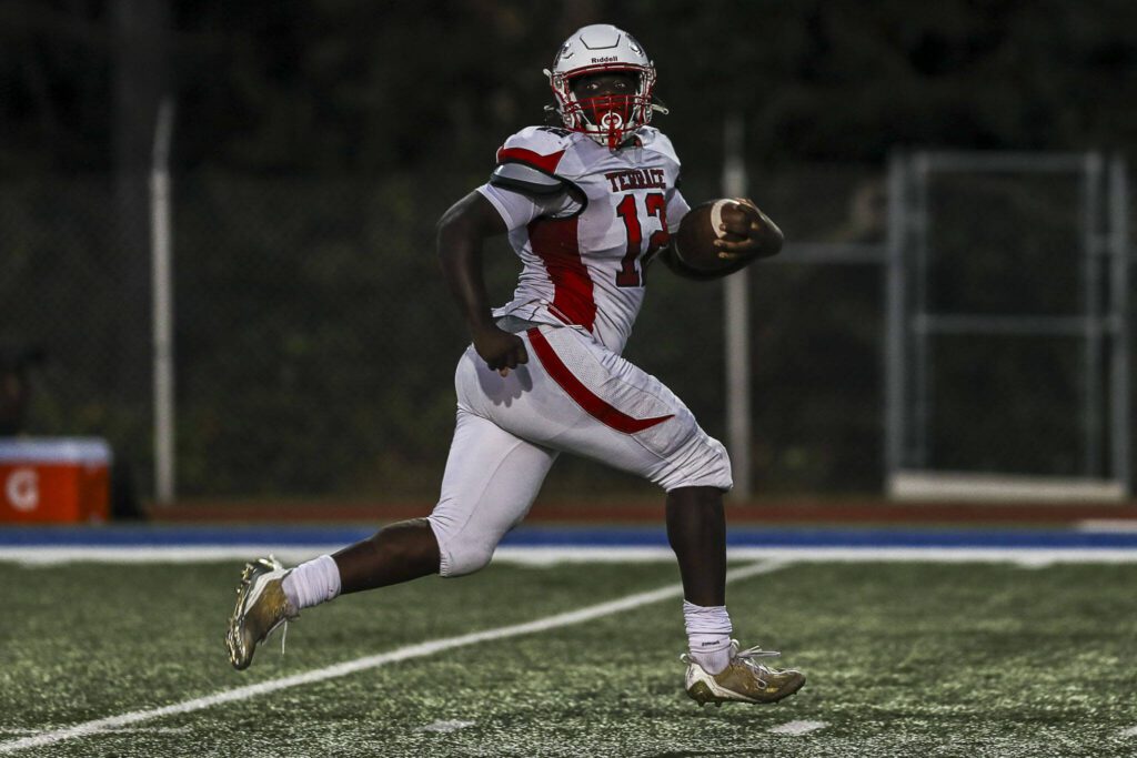 Mountlake Terrace’s Zaveon Jones breaks away during a football game between Mountlake Terrace and Shorewood at Shoreline Stadium in Shoreline on Friday. (Annie Barker / The Herald)
