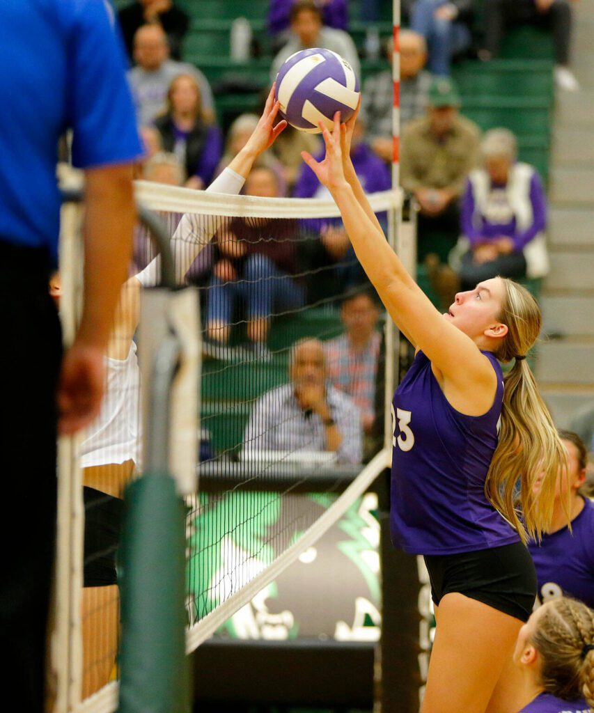 Lake Stevens’ Kamryn Strom blocks the ball against North Creek during the Wesco 4A district 1/2 championship match Saturday, Nov. 11, 2023, at Henry M. Jackson High School in Mill Creek, Washington. (Ryan Berry / The Herald)
