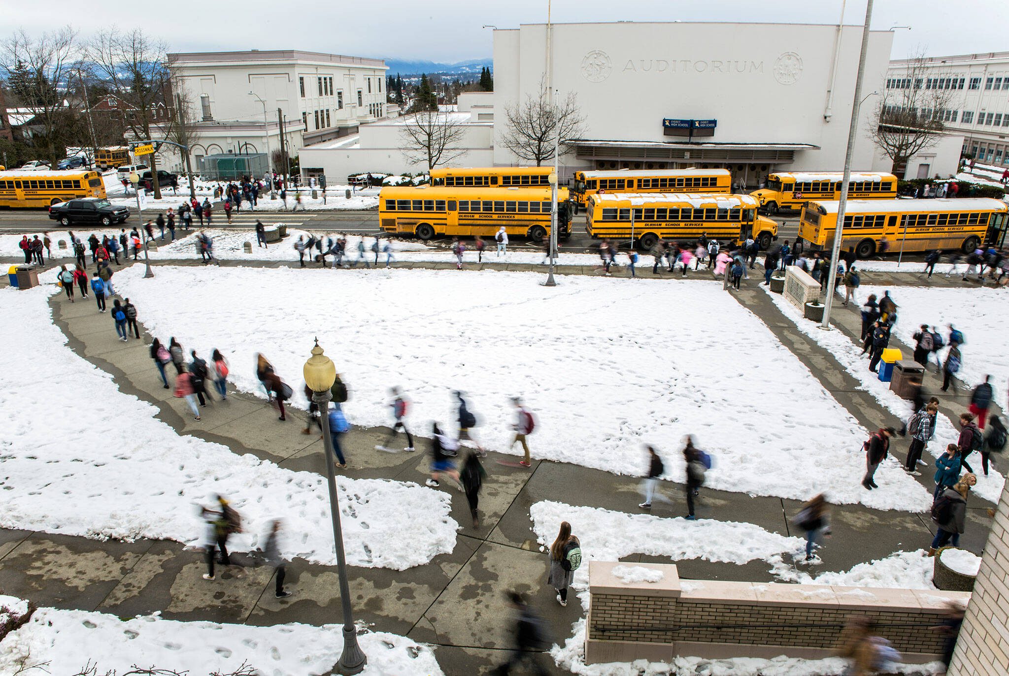 Students exit Everett High School on Thursday, Feb. 14, 2019 after the first day of school since Feb. 8 due to weather cancellations. (Olivia Vanni / The Herald)