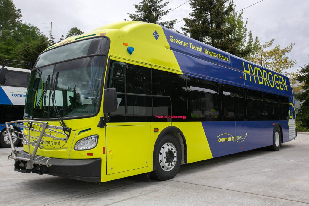 Community Transit’s new hydrogen-powered bus is parked alongside other older, diesel-fueled buses Monday, May 13, 2024, at the Community Transit Operations Base in Everett, Washington. (Ryan Berry / The Herald)
