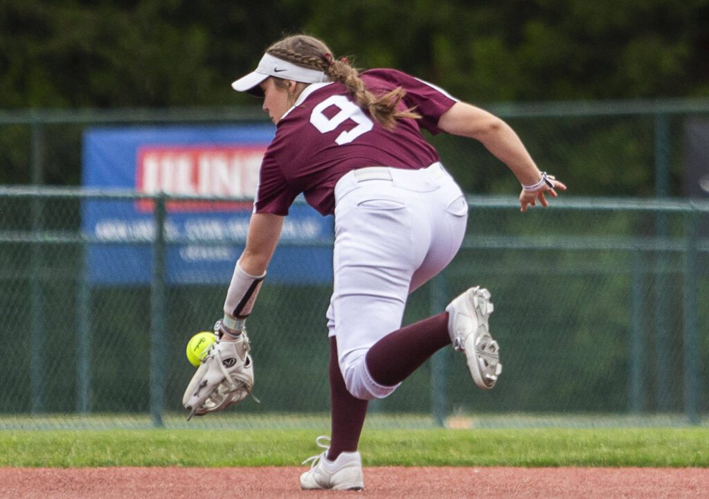 Cascade’s Tessa Hahn fields a ball backhanded during the 3A state softball tournament game against Gig Harbor on Thursday, May 23, 2024 in Lacey, Washington. (Olivia Vanni / The Herald)
