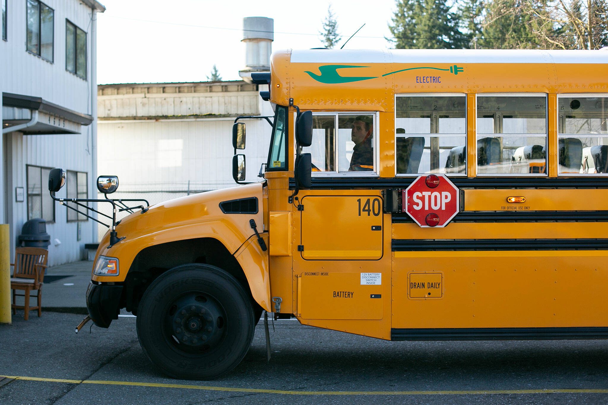 Snohomish School District Transportation Supervisor Karl Hereth backs up the district’s one electric school bus Thursday, March 7, 2024, at the district bus depot in Snohomish, Washington. (Ryan Berry / The Herald)