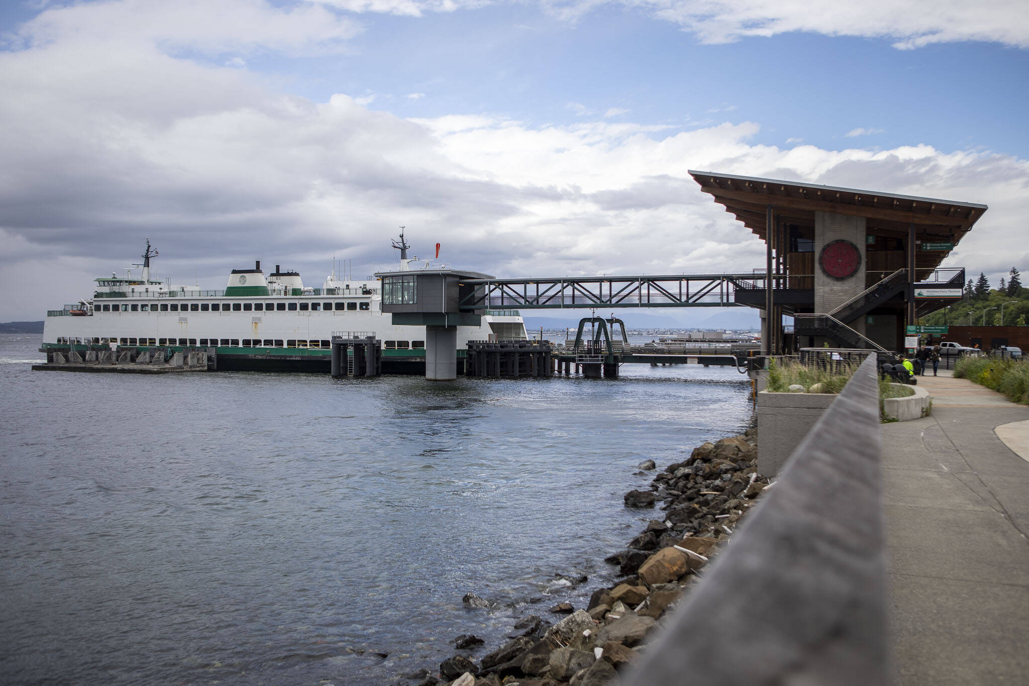 People board and exit the Mukilteo ferry in Mukilteo, Washington on Monday, June 3, 2024. (Annie Barker / The Herald)