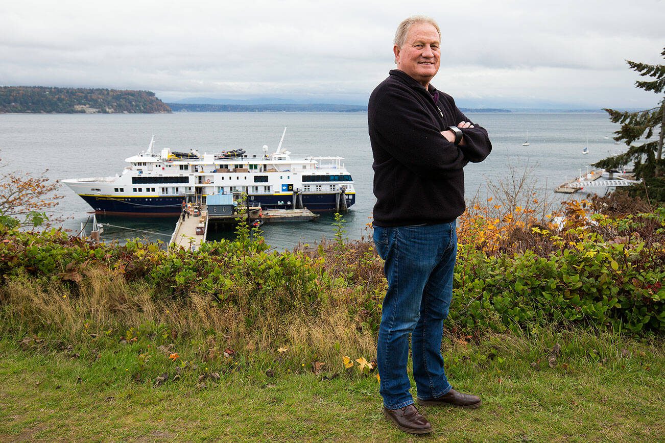 Nichols Brothers Boat Builders Matt Nichols stands overlooking the National Geographic Venture, a 238-foot cruise boat built at NBBB’s Freeland facility, on Thursday, Oct. 25, 2018, in Langley, Washington. (Andy Bronson / The Herald)