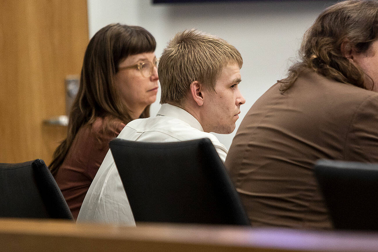 Avery Bresnan, center listens as the jury is polled after a guilty verdict at the end of his trial at the Snohomish County Courthouse on Wednesday, July 3, 2024 in Everett, Washington. (Olivia Vanni / The Herald)