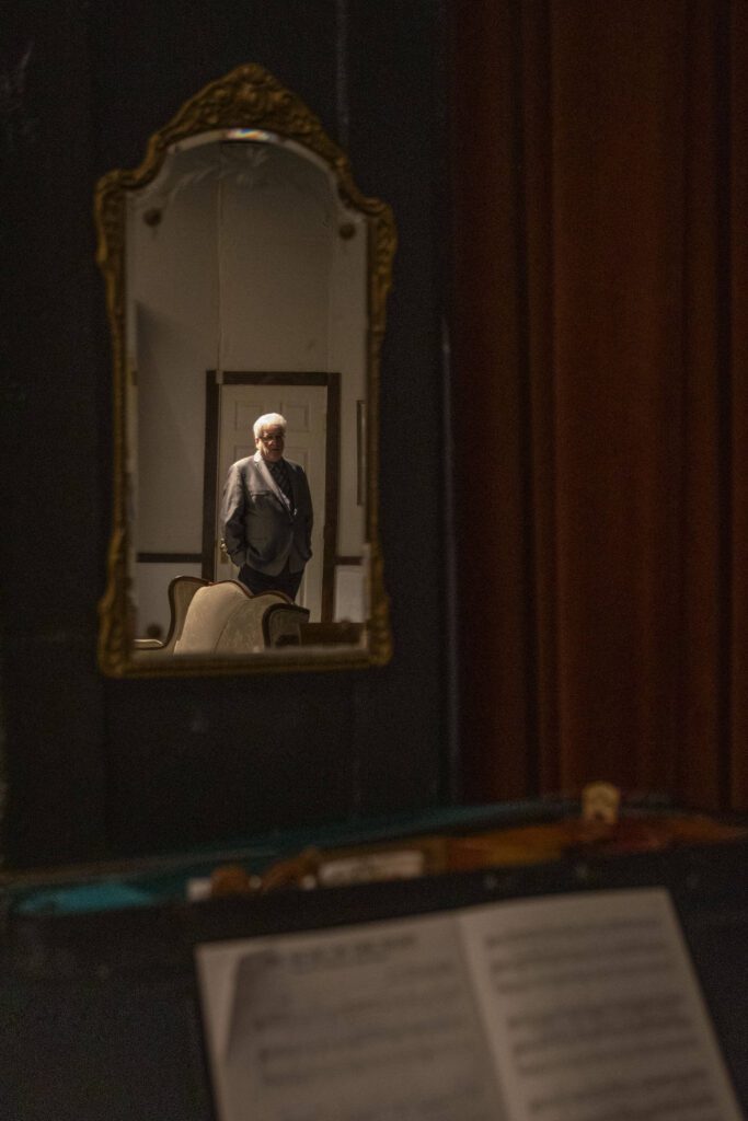 Curt Shriner poses for a photo at the Historic Everett Theatre in Everett on July 24, 2024. (Annie Barker / The Herald)
