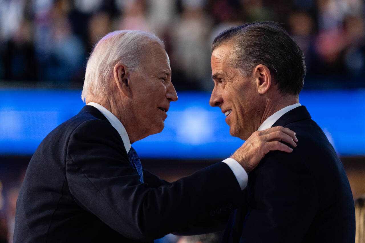 President Joe Biden embraces his son Hunter Biden after his speech on the first night of the Democratic National Convention in Chicago, Aug. 19. President Biden issued a full and unconditional pardon of Hunter on Sunday, Dec. 1, using the power of his office to waive years of legal troubles, including a federal conviction for illegally buying a gun. (Eric Lee / The New York Times)