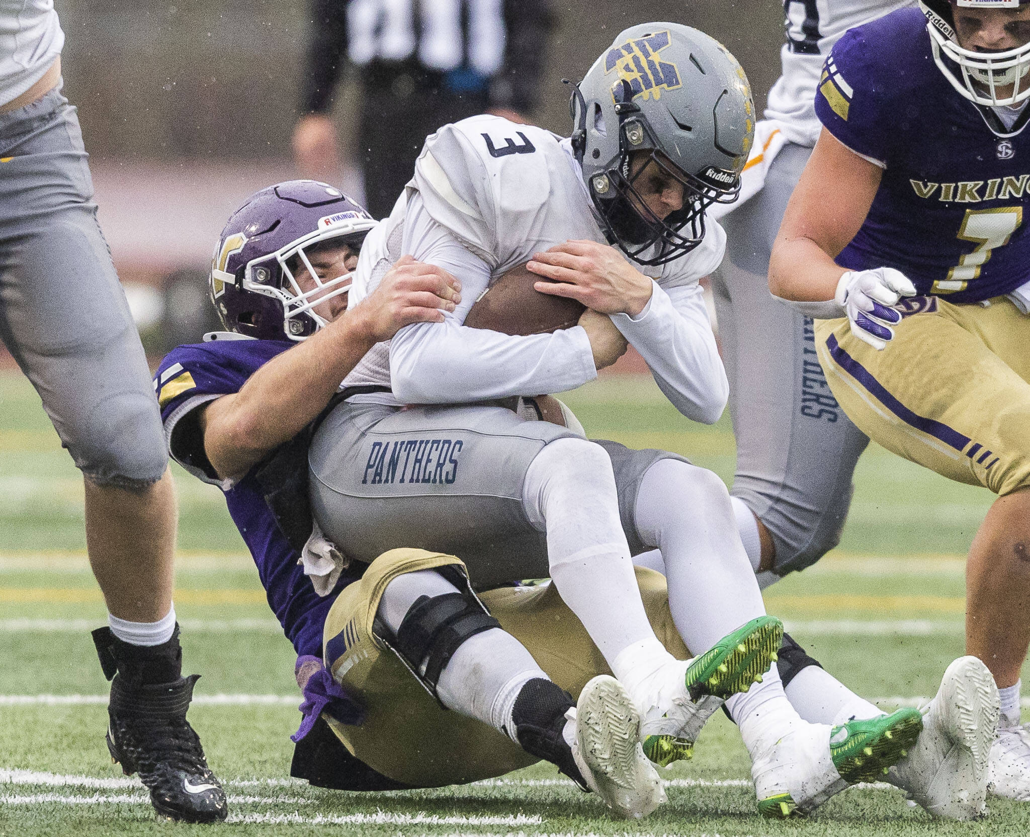 Olivia Vanni / The Herald
Lake Stevens’ Luke Baird sacks Mead’s Jaeland Leman during the 4A state playoff game against Lake Stevens on Saturday, Nov. 16, 2024 in Lake Stevens, Washington. Mead’s head coach, Keith Stamps, was fired on Wednesday for allegedly failing to report player misconduct.