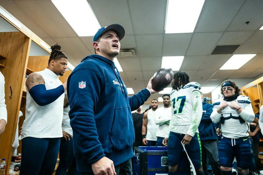 Seahawks head coach Mike Macdonald celebrates a win over the Chicago Bears in a Soldier Field locker room on Thurday, Dec. 27, 2024. (Photo courtesy of the Seattle Seahawks)