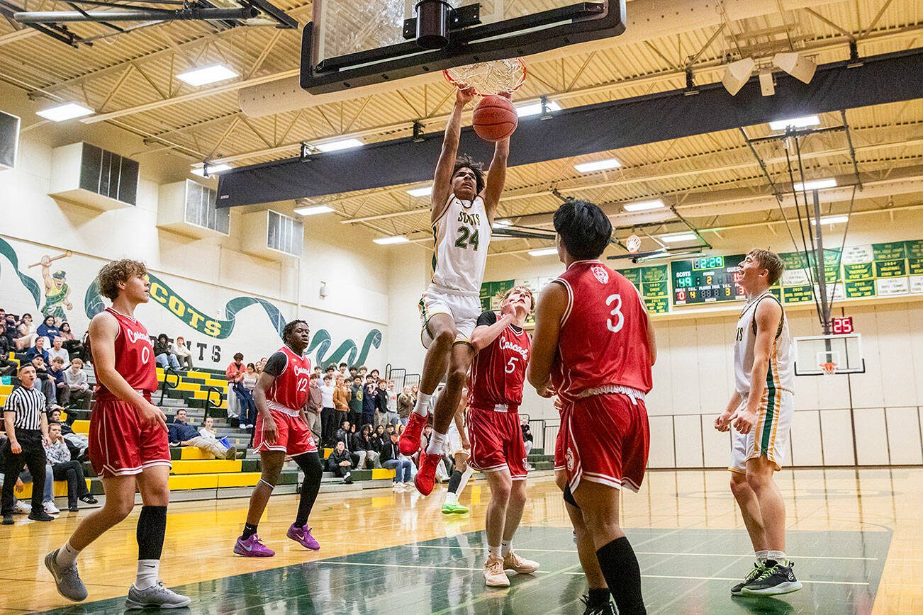 Shorecrest’s Devan Jones dunks the ball during the game against Cascade on Monday, Dec. 30, 2024 in Shoreline, Washington. (Olivia Vanni / The Herald)