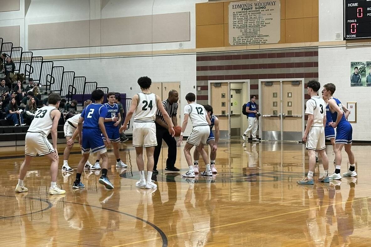 Edmonds-Woodway and Shorewood boys basketball prepare for tip-off during a league game on Jan. 14, 2025 at Edmonds-Woodway High School.