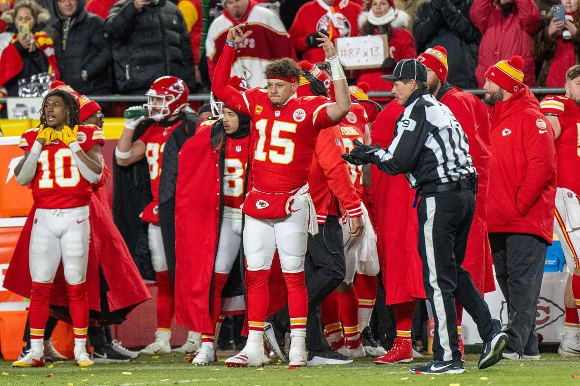 Kansas City Chiefs quarterback Patrick Mahomes (15) waves his hands up in attempt to pump up the crowd in the fourth quarter during the AFC Divisional Round playoff game against the Houston Texans on Saturday, Jan. 18, 2025, at GEHA Field at Arrowhead Stadium. (Emily Curiel / ecuriel@kcstar.com / Tribune News Services)