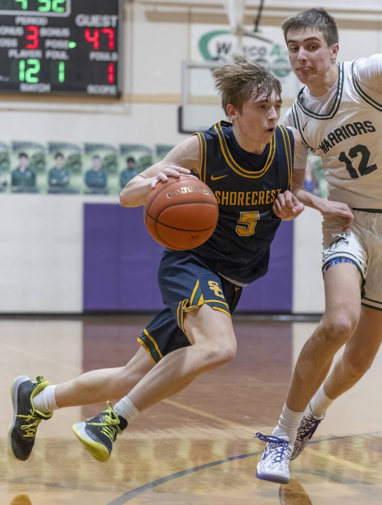 Shorecrest’s Brayden Fischer tries to maneuver around Edmonds-Woodway’s William Alseth during the game on Tuesday, Jan. 28, 2025 in Edmonds, Washington. (Olivia Vanni / The Herald)
