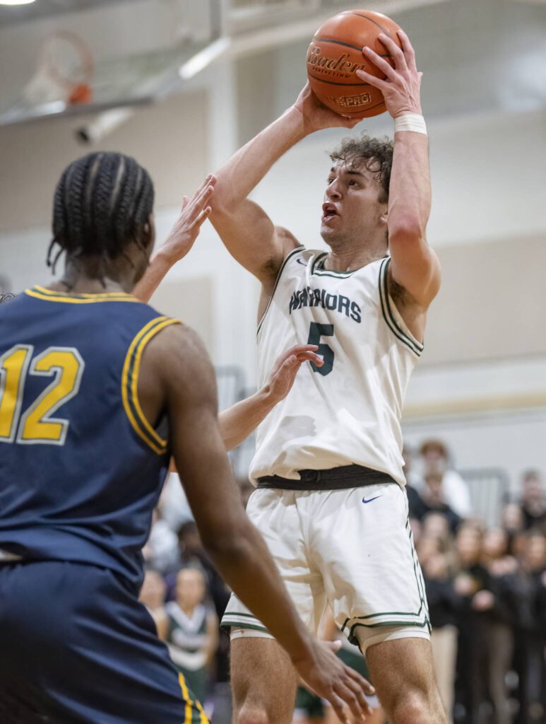 Edmonds-Woodway’s Cam Hiatt makes a jump shot during the game against Shorecrest on Tuesday, Jan. 28, 2025 in Edmonds, Washington. (Olivia Vanni / The Herald)
