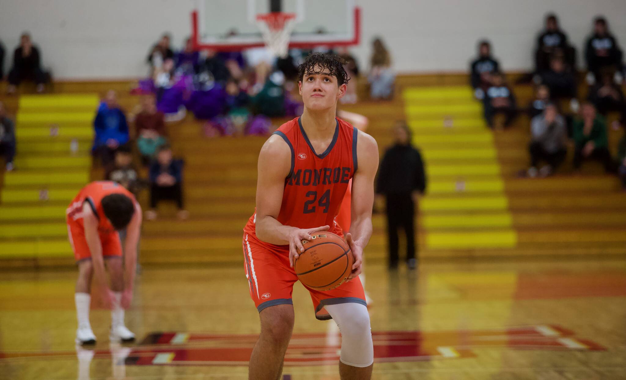 Monroe junior Chayce Waite-Kellar attempts a free throw during the Boys 3A District 1 Basketball Tournament in Marysville, Washington on Feb. 19, 2025. (Joe Pohoryles / The Herald)