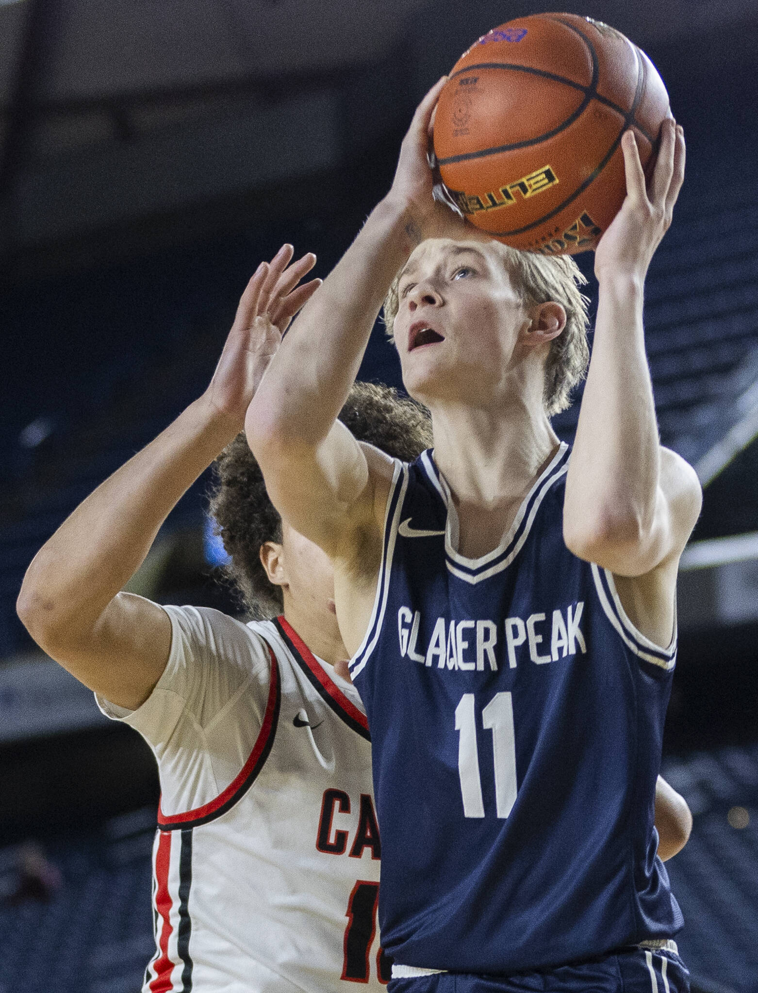 Glacier Peak’s Reed Nagel makes a layup during the 4A boys quarterfinal game against Camas on Thursday, March 6, 2025 in Tacoma, Washington. (Olivia Vanni / The Herald)