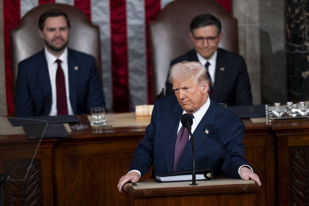 President Donald Trump delivers an address to a joint session of Congress at the Capitol in Washington, on Tuesday, March 4, 2025. Republicans were so rowdy for so much of the night — roaring at Trump’s talk about the border and his legal and political victories; jumping to their feet at his declaration that “wokeness is trouble, wokeness is bad” — that it was telling when they just sat still. (Doug Mills/The New York Times)